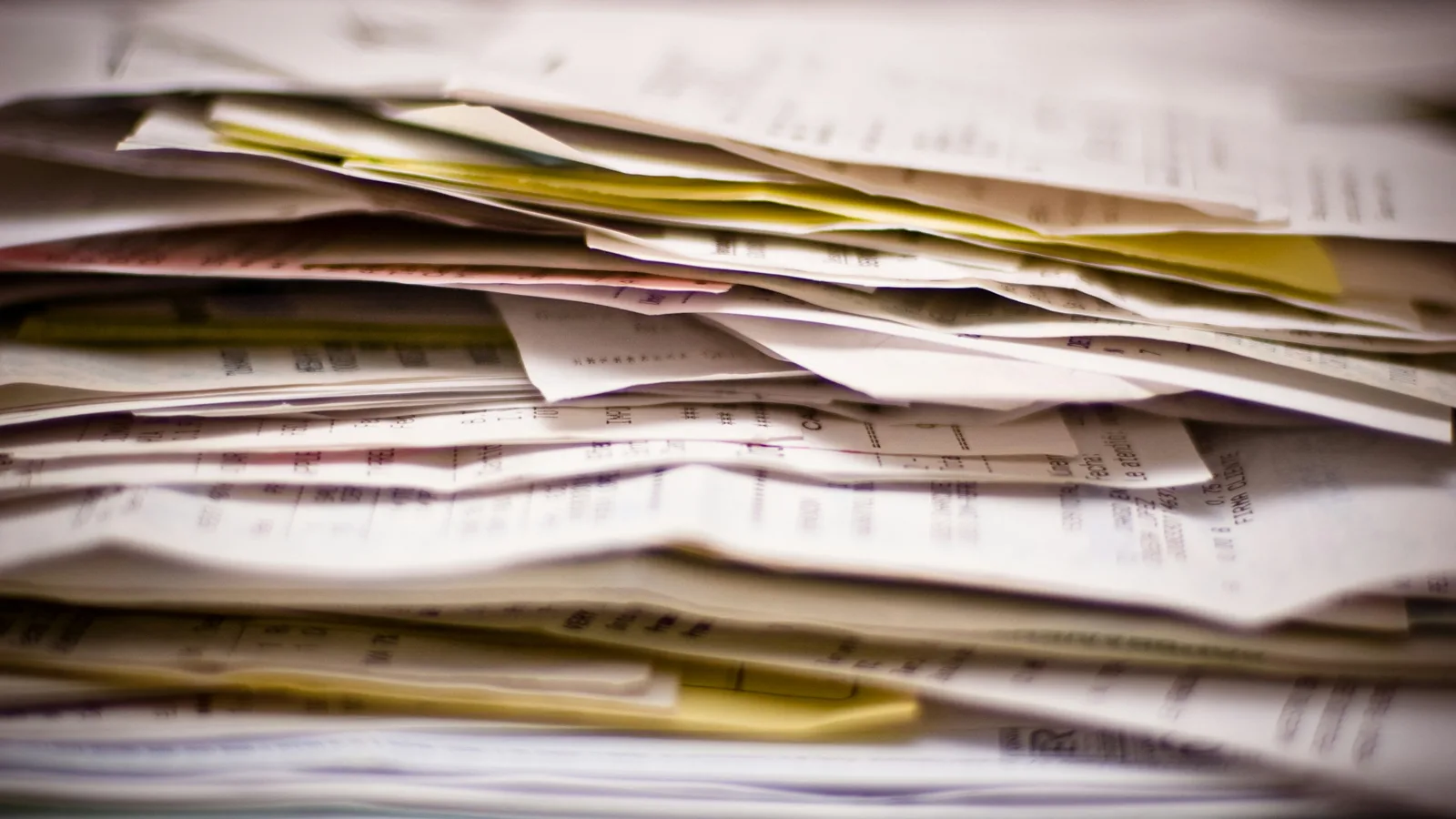 A close-up of a stack of papers.
