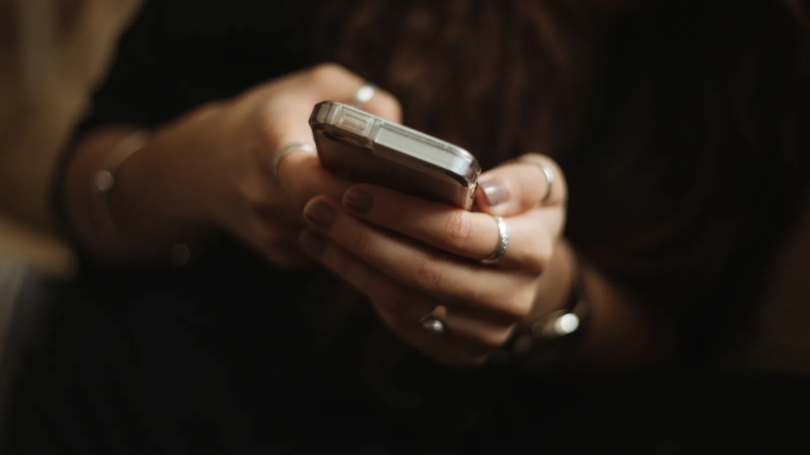 Person using smartphone.