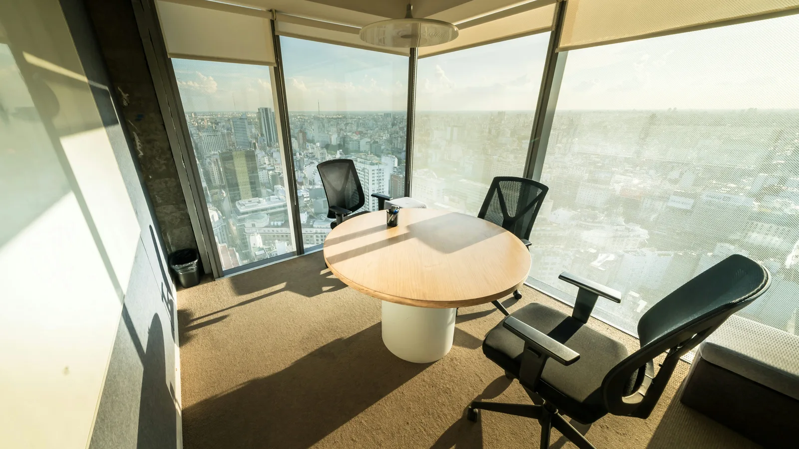 Modern meeting room with city view.