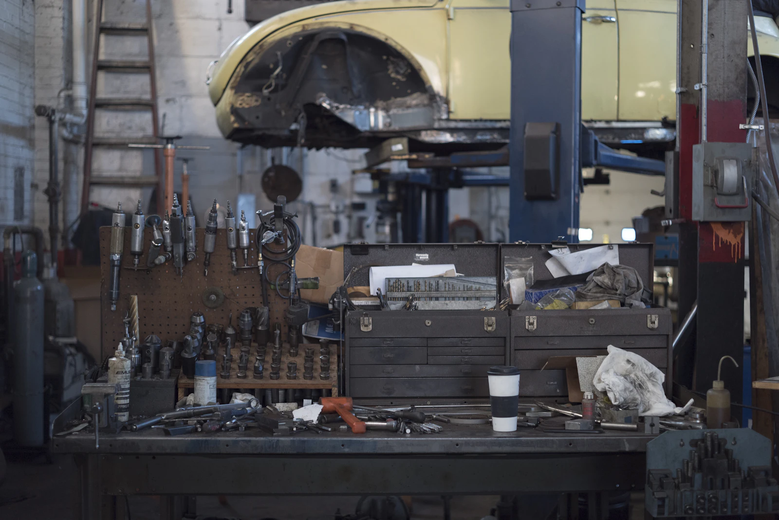 Workbench and tools inside an automotive repair shop